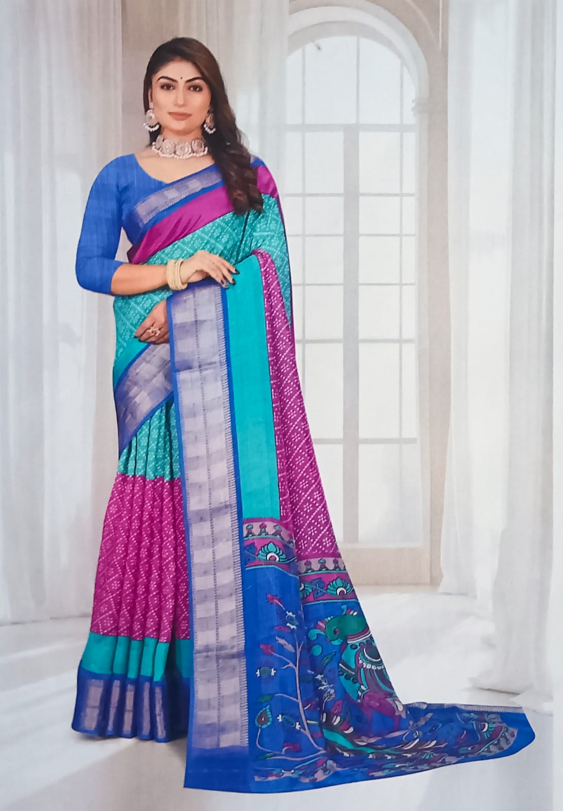 Bandhini Dola Silk Saree with contrast blouse